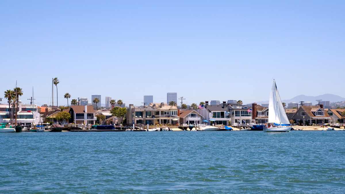 Newport Harbor in Orange County with Fashion Island in the background